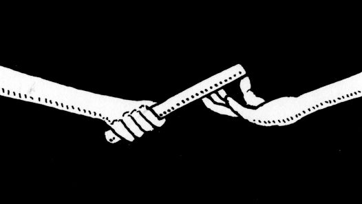 Caron image of a baton passing between two hands